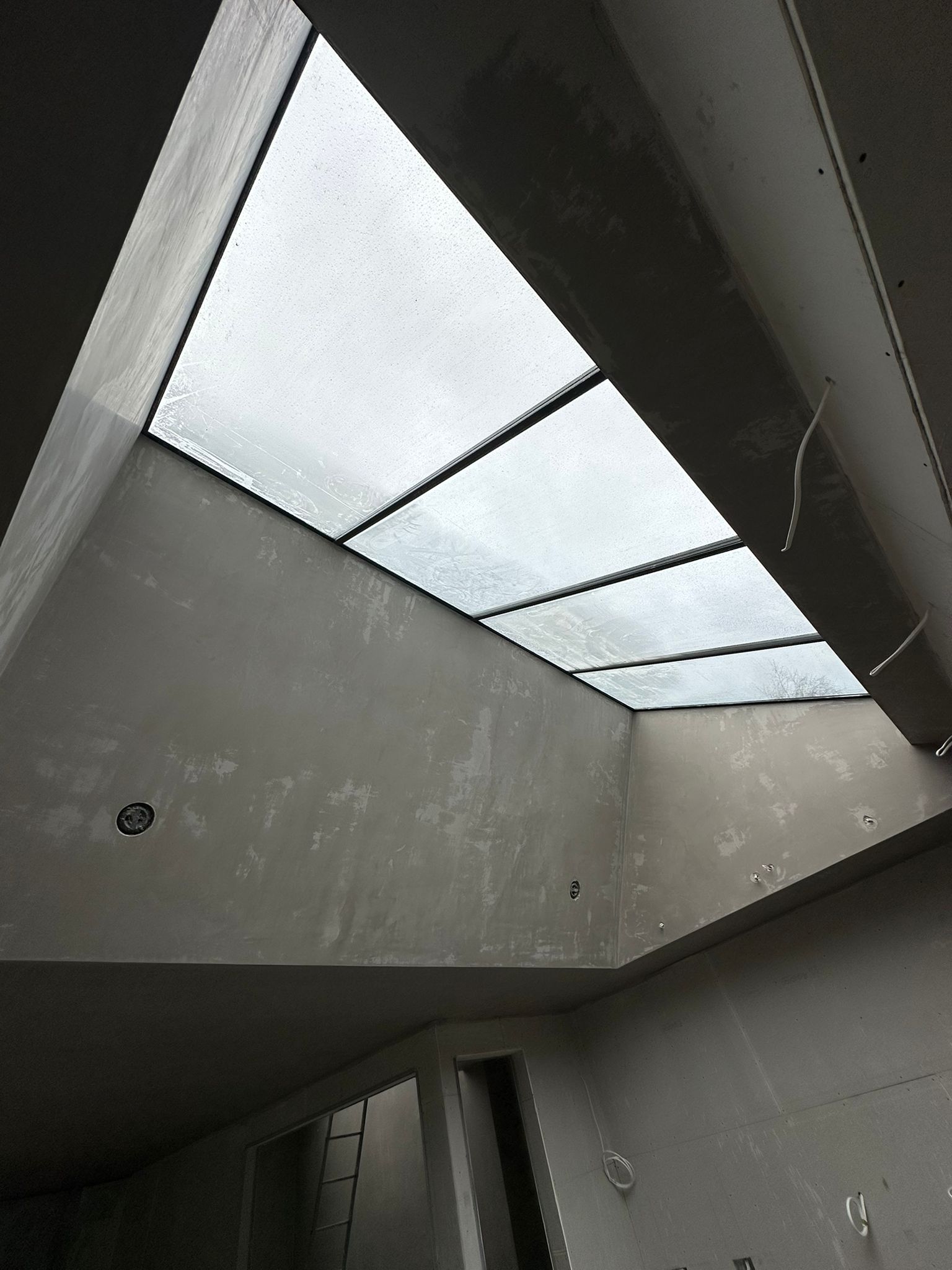 Plastered ceiling with skylight opening — internal renovation by Causani Plastering