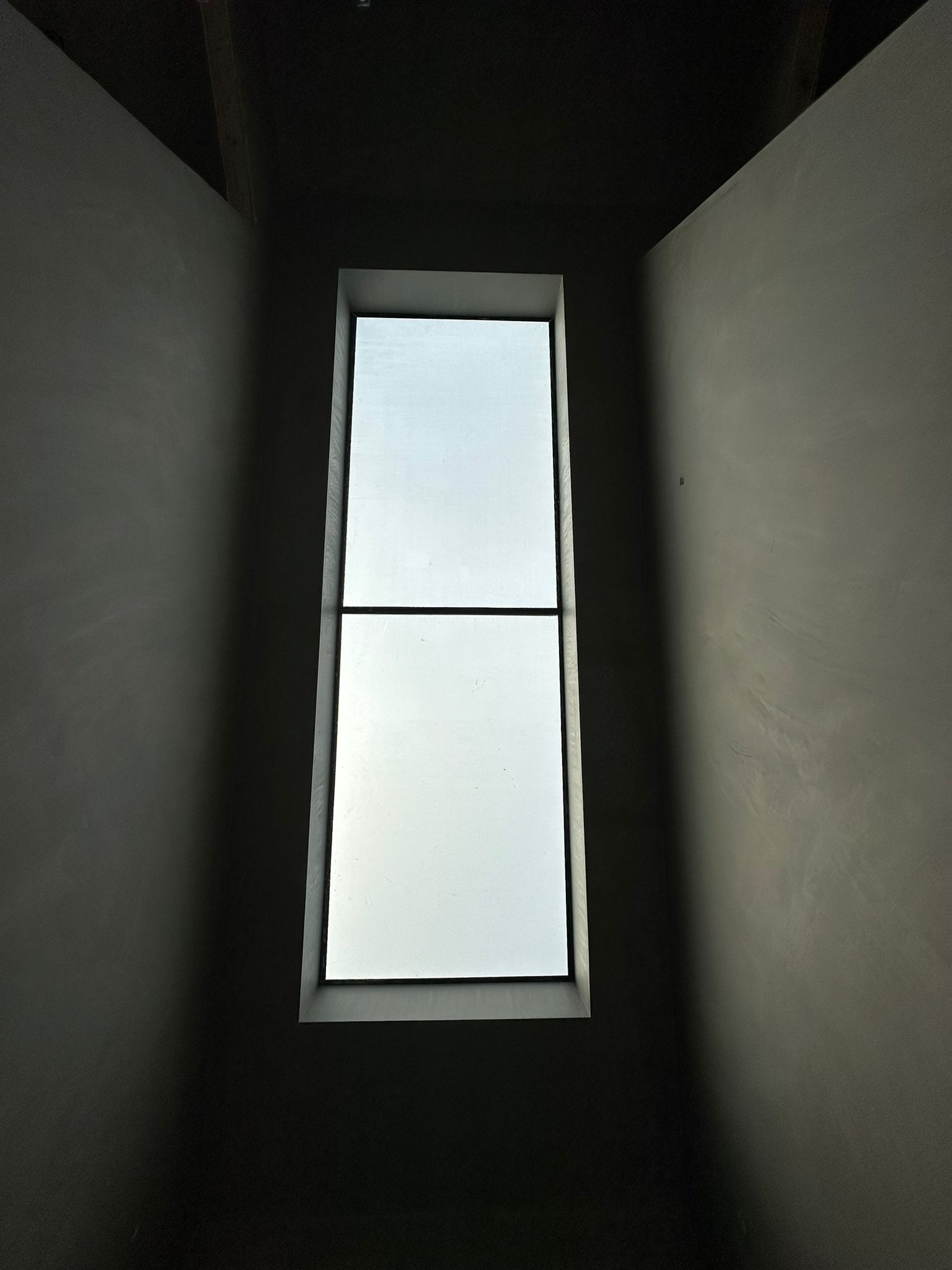 Window reveal plastering — deep reveal smooth plaster finish by Causani Plastering